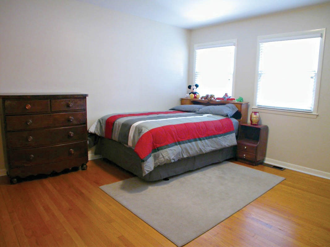 4709 Wedgewood Street Raleigh, NC 27612 - Photo 18 of 25 3rd bedroom for more space and comfort in this wonderful home. Bedroom