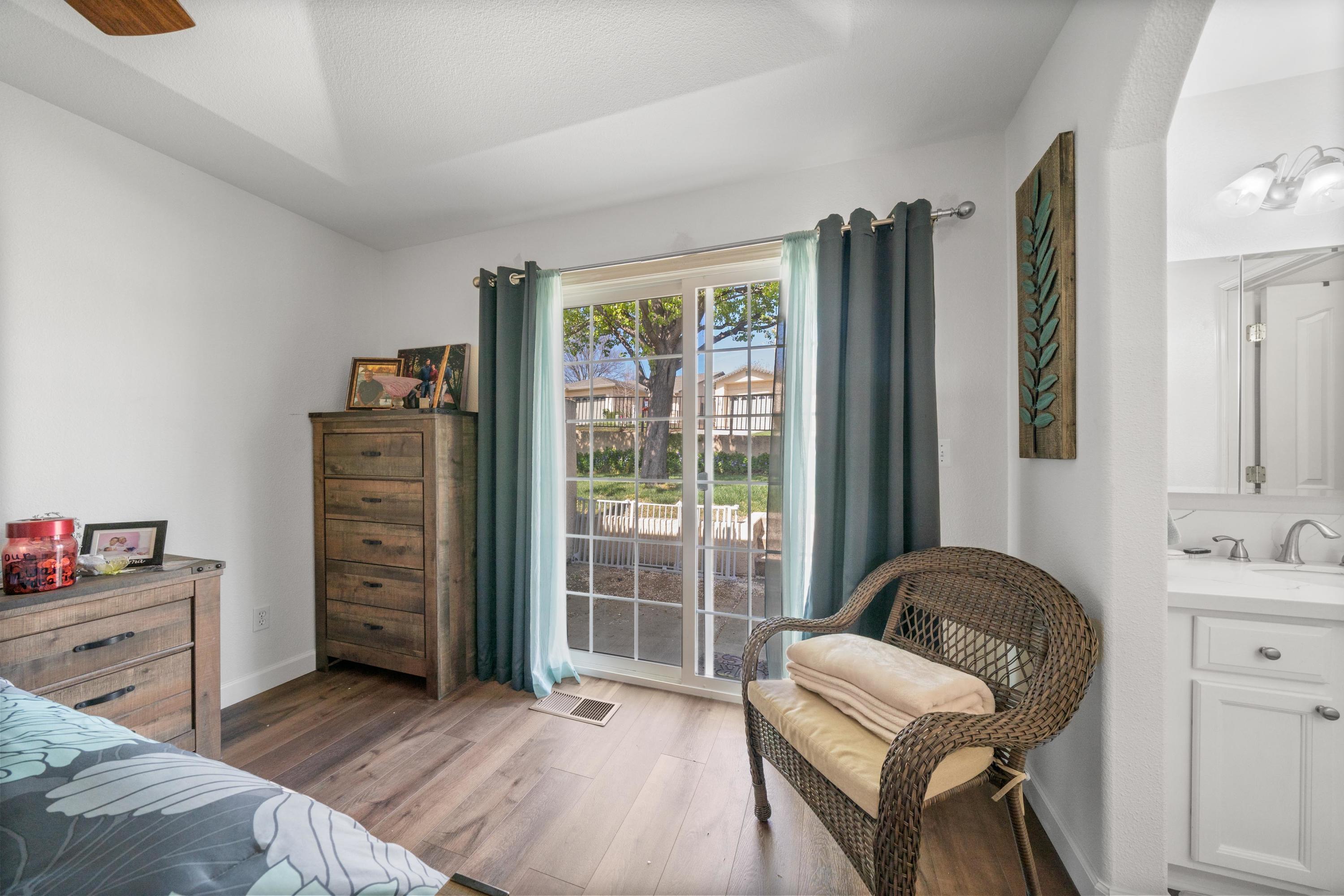 775 Stonebriar Trail Redding, CA 96003 - Photo 16 of 32 a bedroom with furniture and a window