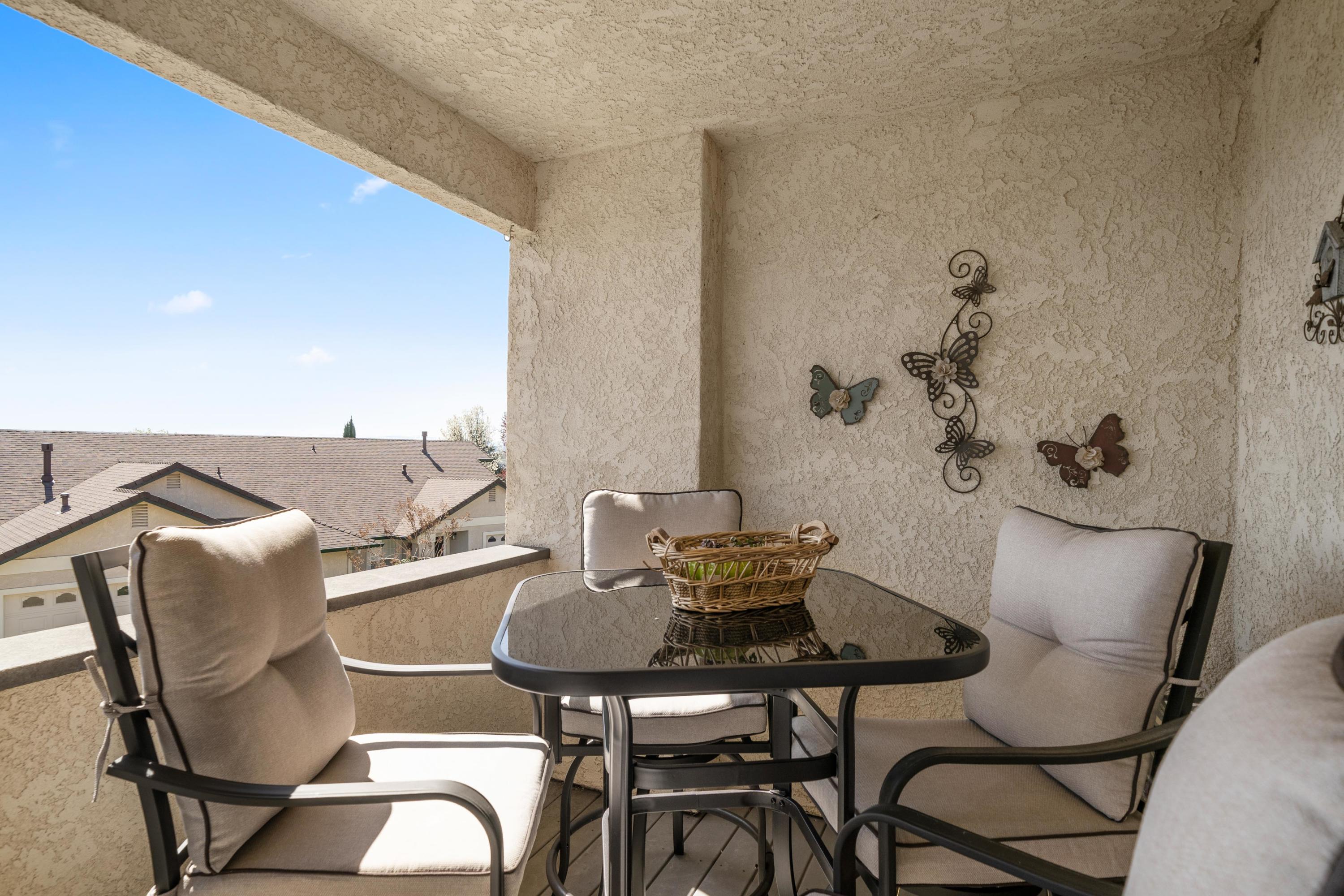 775 Stonebriar Trail Redding, CA 96003 - Photo 25 of 32 a view of a dining room with furniture