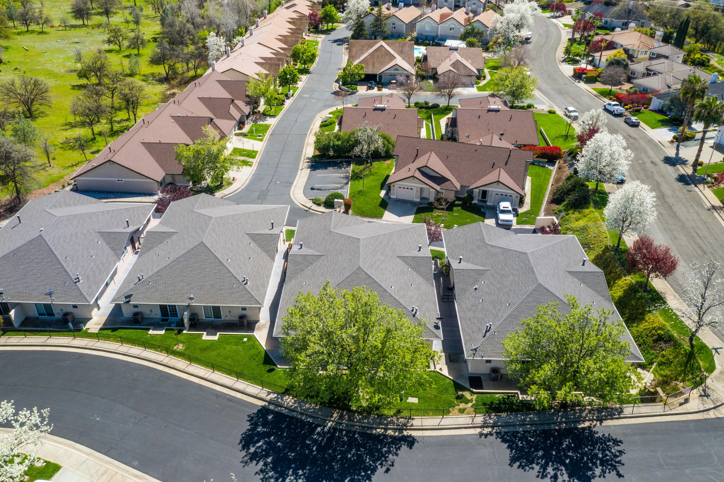 775 Stonebriar Trail Redding, CA 96003 - Photo 26 of 32 an aerial view of a house with a garden