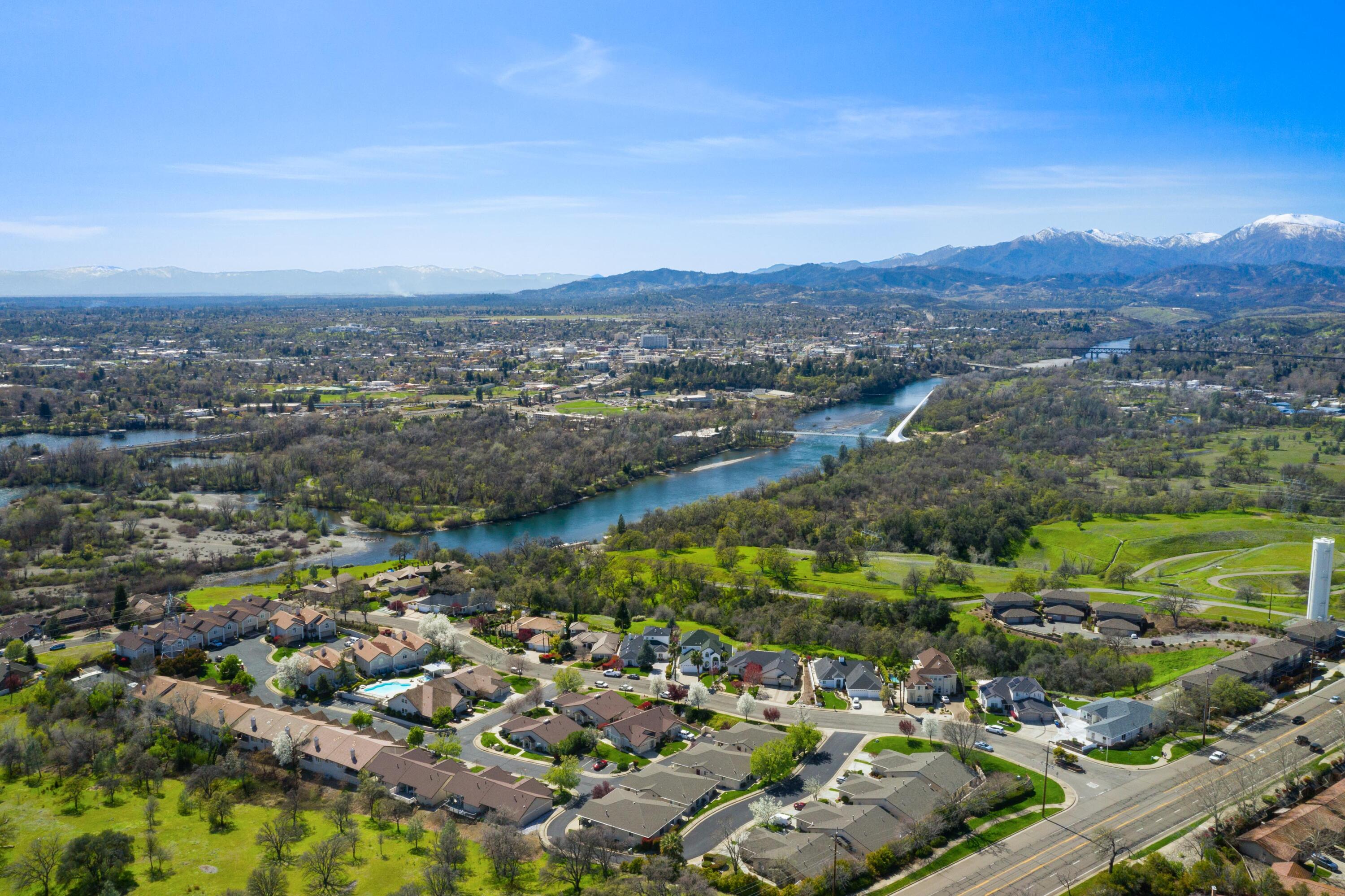 775 Stonebriar Trail Redding, CA 96003 - Photo 27 of 32 an aerial view of residential houses with outdoor space and trees