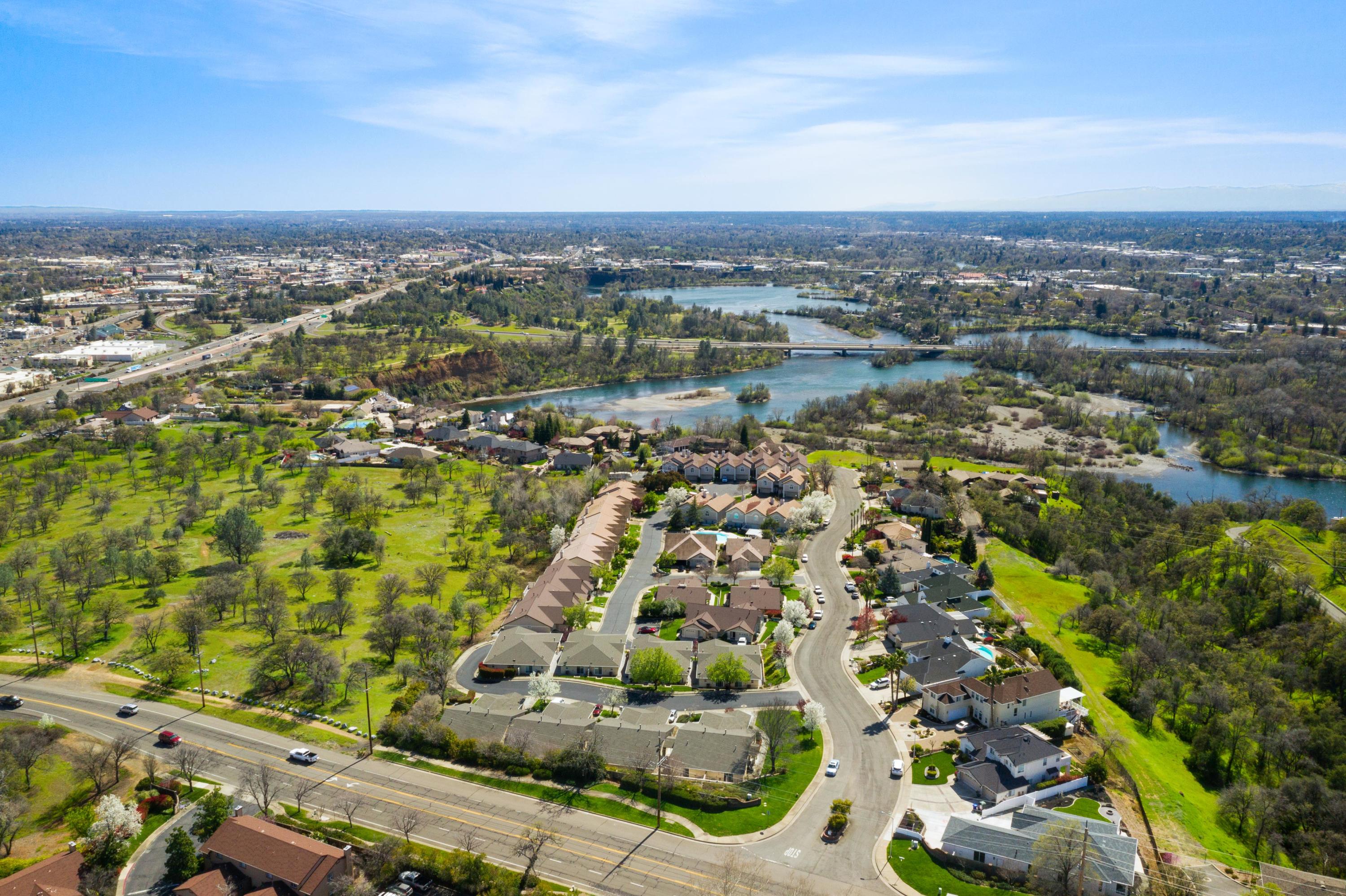 775 Stonebriar Trail Redding, CA 96003 - Photo 29 of 32 an aerial view of residential houses with outdoor space