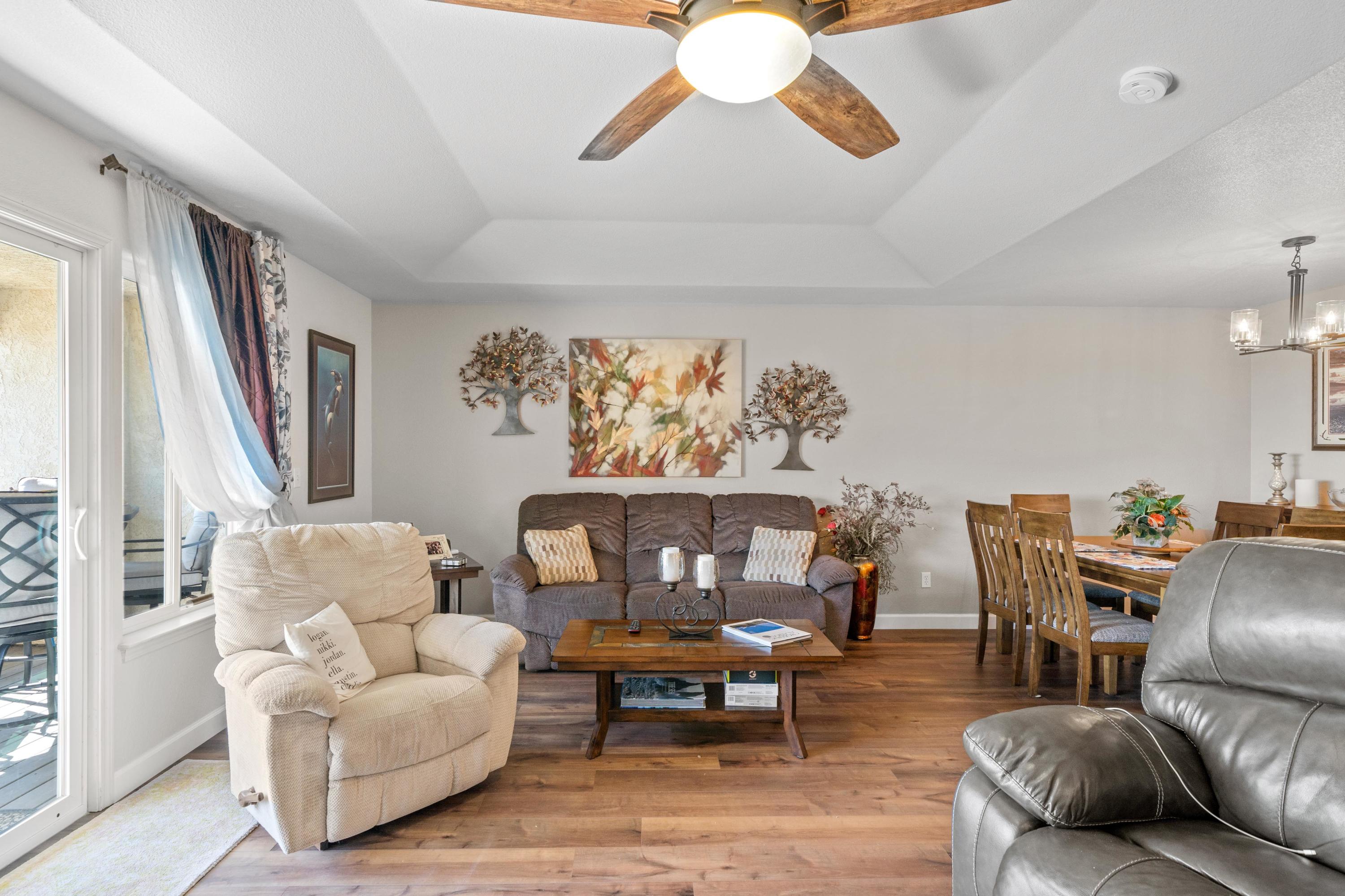 775 Stonebriar Trail Redding, CA 96003 - Photo 3 of 32 a living room with furniture and a large window