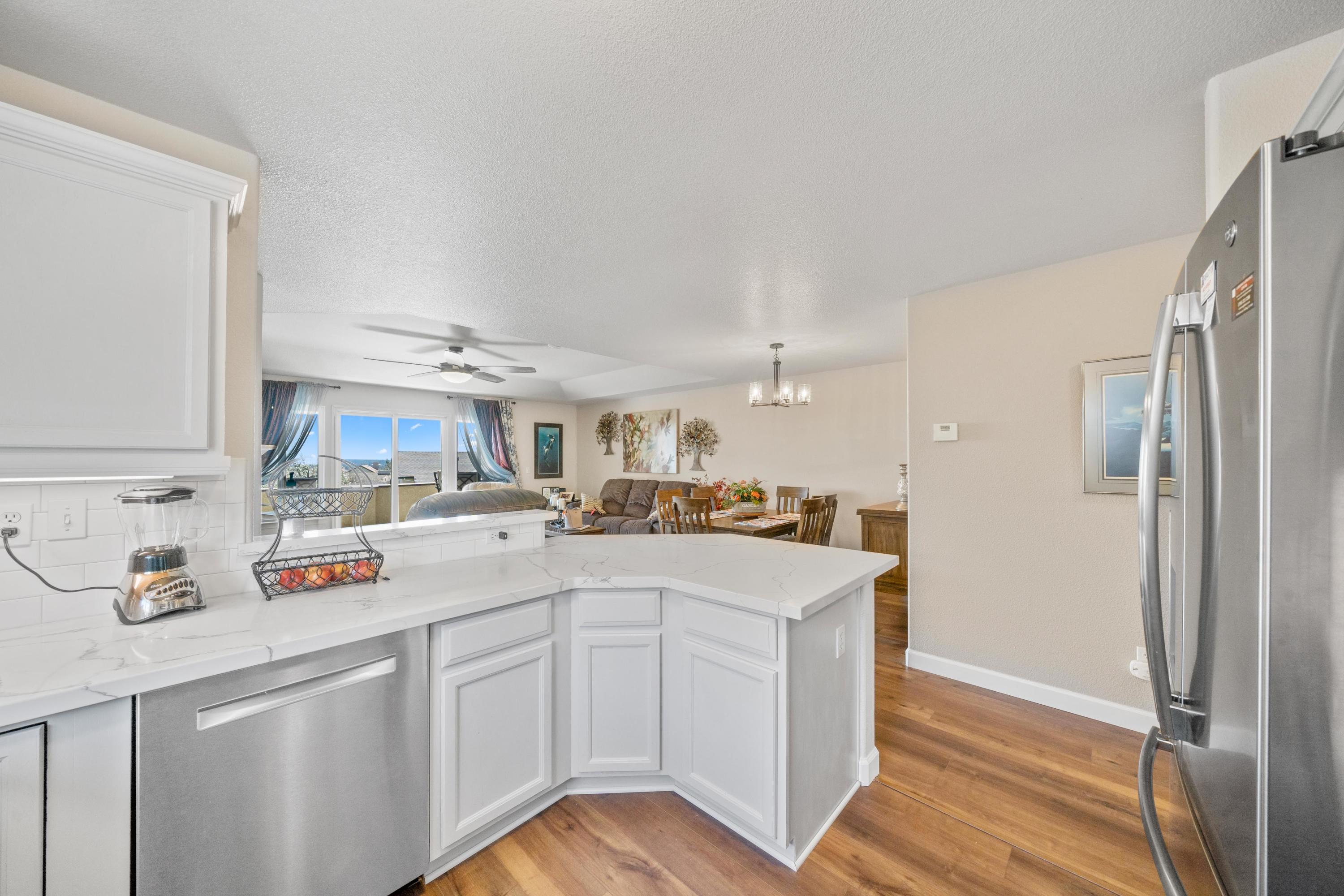775 Stonebriar Trail Redding, CA 96003 - Photo 6 of 32 a kitchen with cabinets a sink and appliances