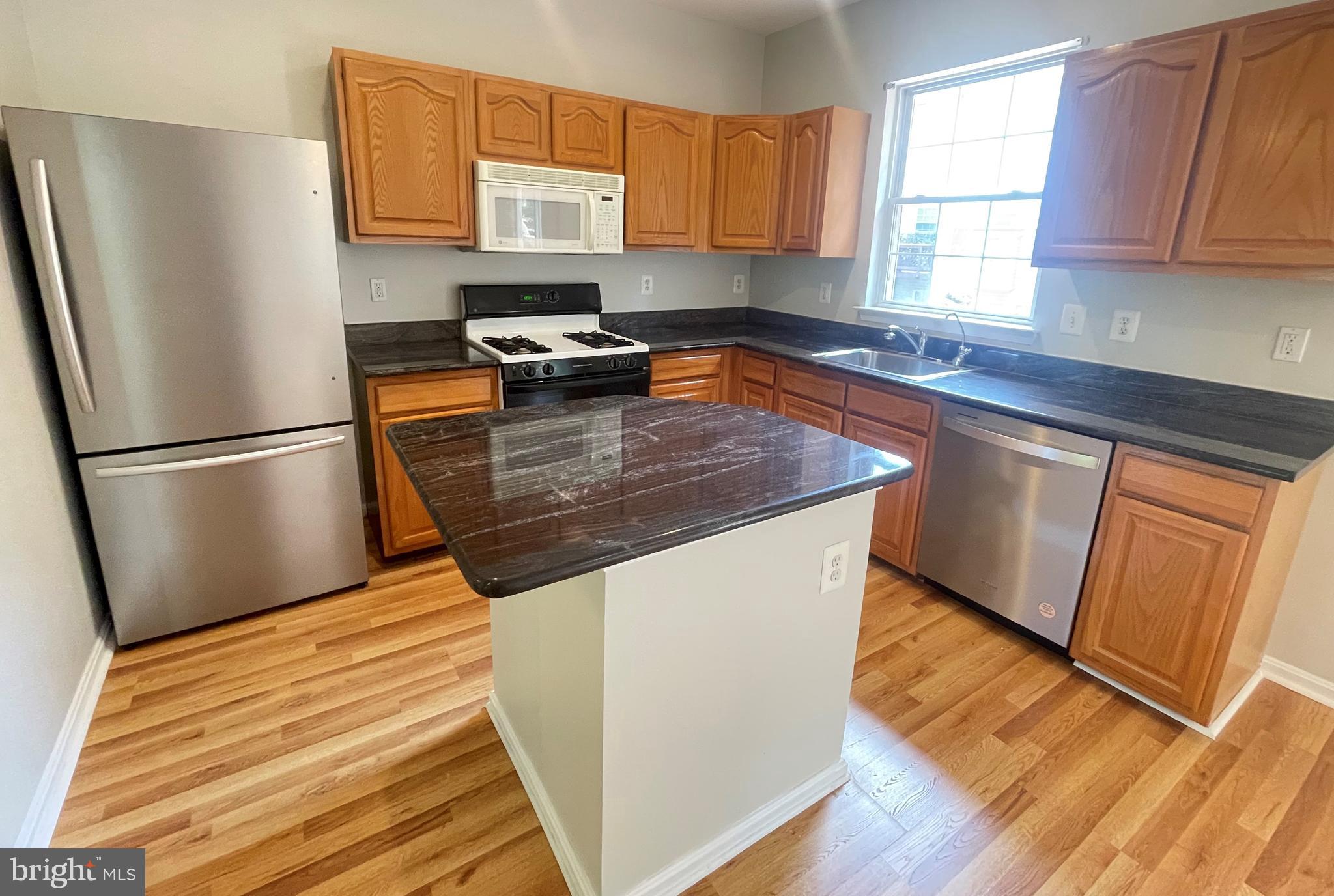 13342 Rushing Water Way Germantown, MD 20874 - Photo 4 of 33 Kitchen new stain-less steel fridge and dishwasher
