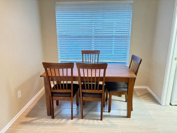 a view of a dining room with furniture
