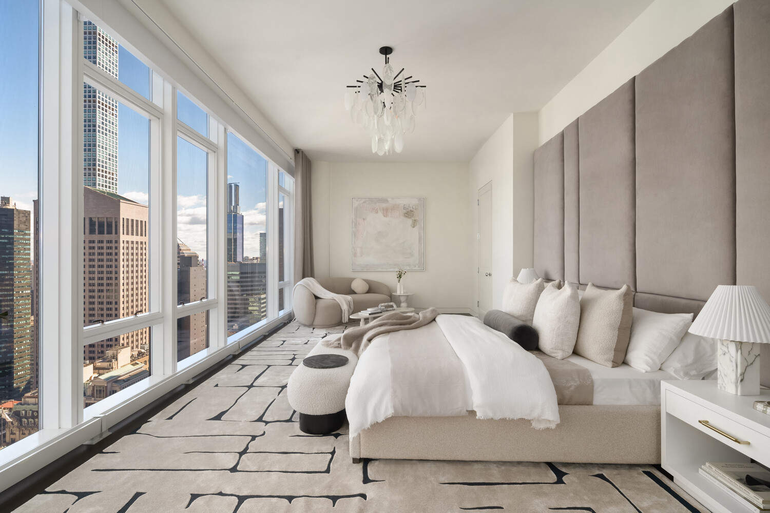 20 West 53rd Street, Unit PH43 Manhattan, NY 10019 - Photo 7 of 14 a bedroom with bed and a large window with balcony view