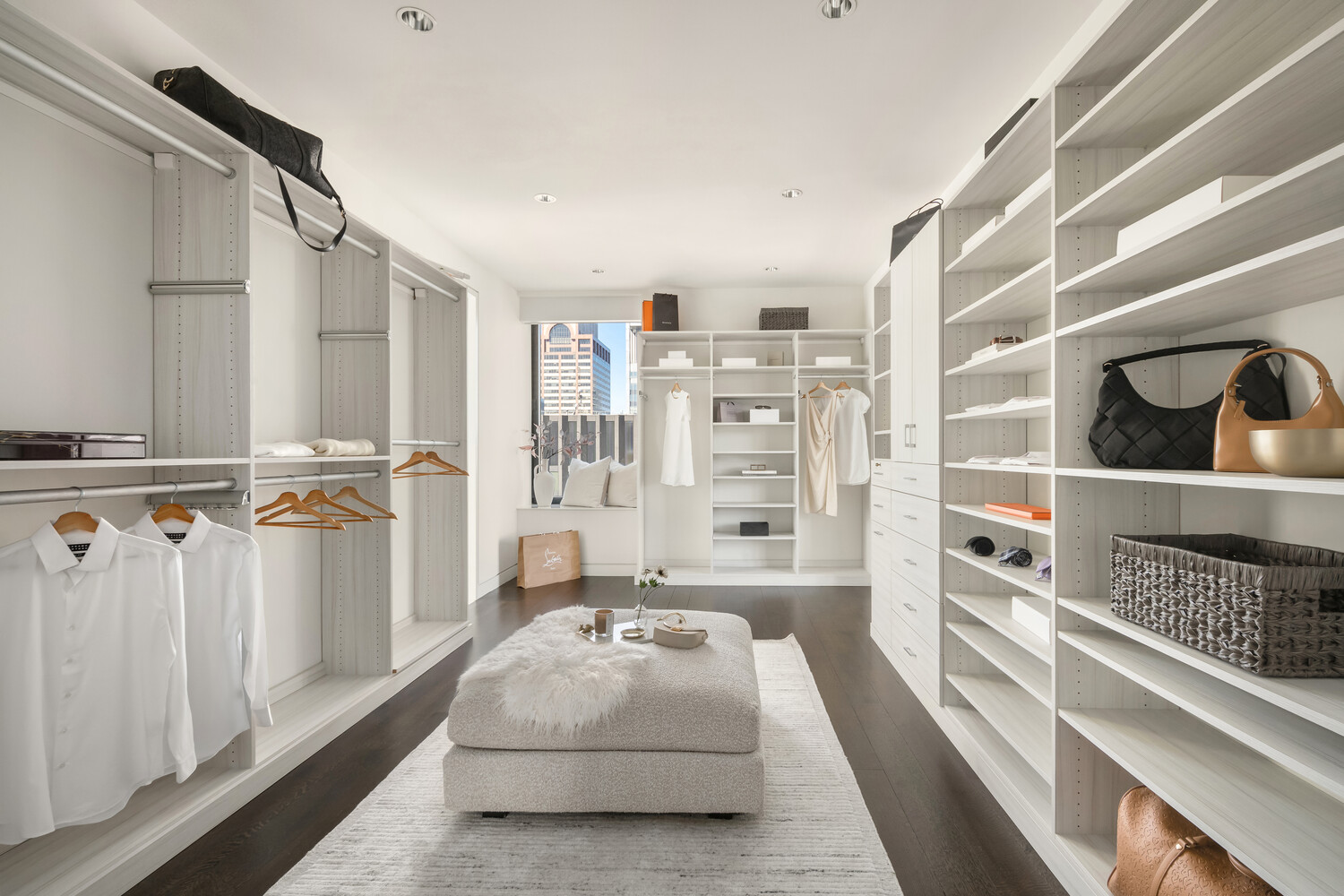 20 West 53rd Street, Unit PH43 Manhattan, NY 10019 - Photo 8 of 14 a bedroom with a bed and a window