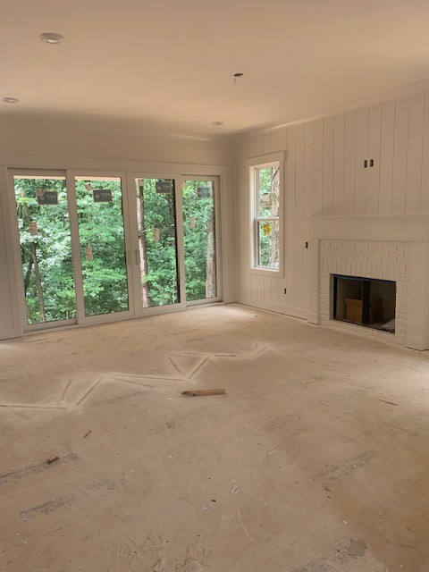 5855 Fisher Grove Road Greenbrier, TN 37073 - Photo 3 of 18 a view of an empty room with a fireplace and a window