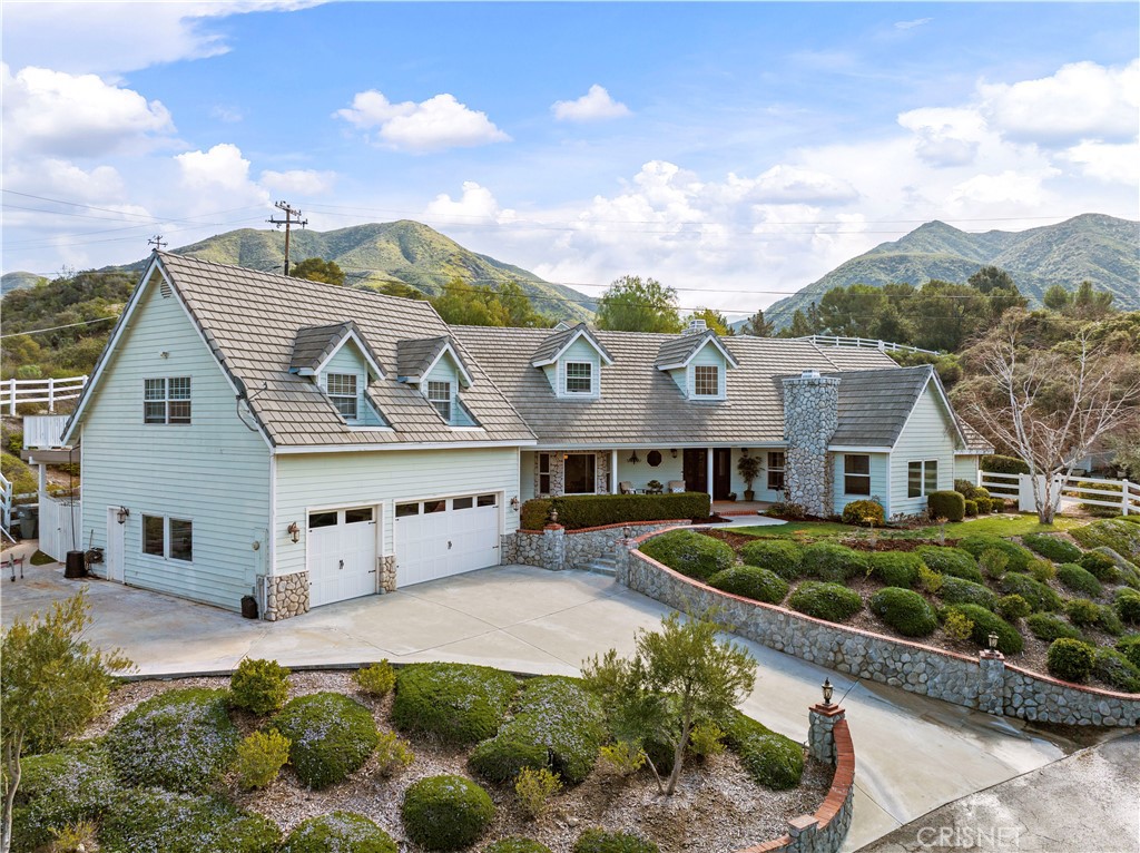 15341 Iron Canyon Road Canyon Country, CA 91387 - Photo 1 of 1 a front view of a house with a yard