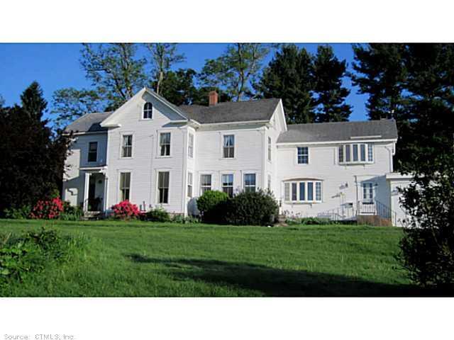 54 Higley Road Granby, CT 06090 - Photo 1 of 1 a view of a house with a garden