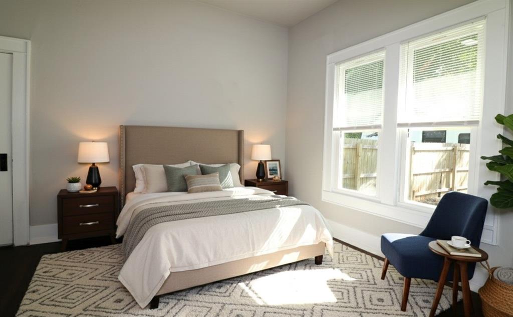 929 Vitalious Street Ranger, TX 76470 - Photo 14 of 22 Bedroom with wood finished floors