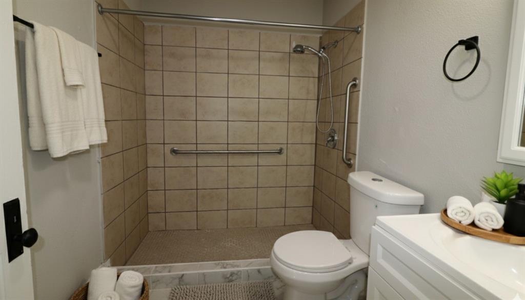 929 Vitalious Street Ranger, TX 76470 - Photo 16 of 22 Full bath with a stall shower and vanity