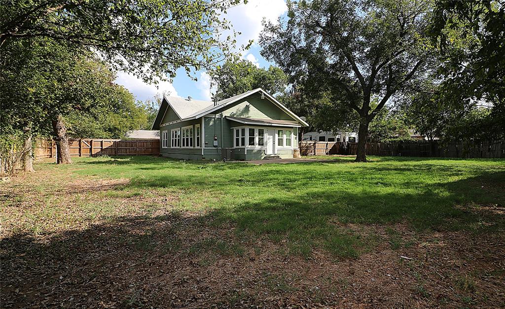 929 Vitalious Street Ranger, TX 76470 - Photo 22 of 22 Rear view of property with a fenced backyard