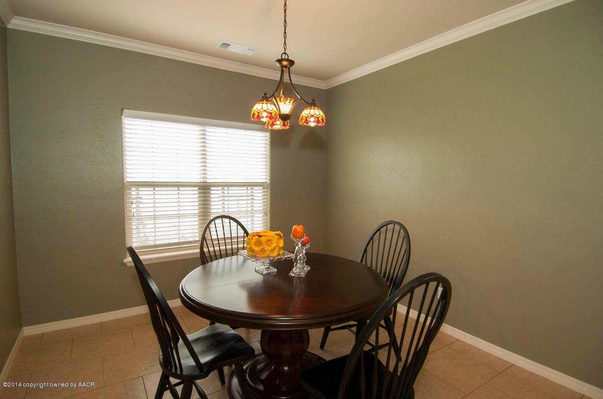 18301 Copper Ridge Bushland, TX 79124 - Photo 11 of 38 a dining room with furniture and window