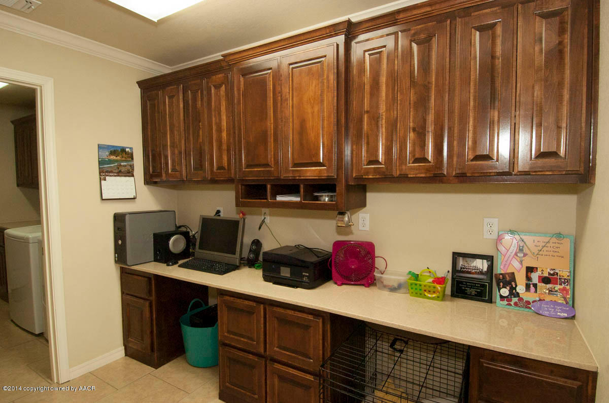 18301 Copper Ridge Bushland, TX 79124 - Photo 12 of 38 a kitchen with a cabinets and appliances