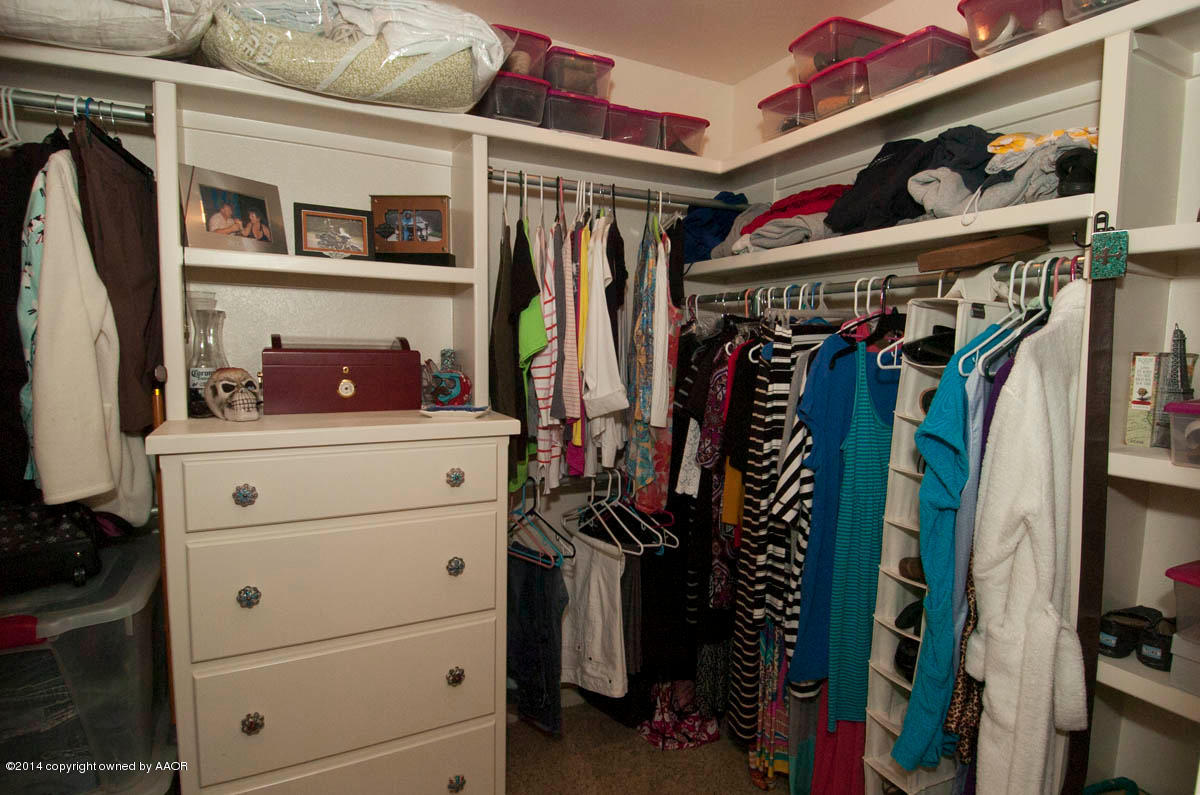 18301 Copper Ridge Bushland, TX 79124 - Photo 15 of 38 a view of walk in closet with clothes and shoes