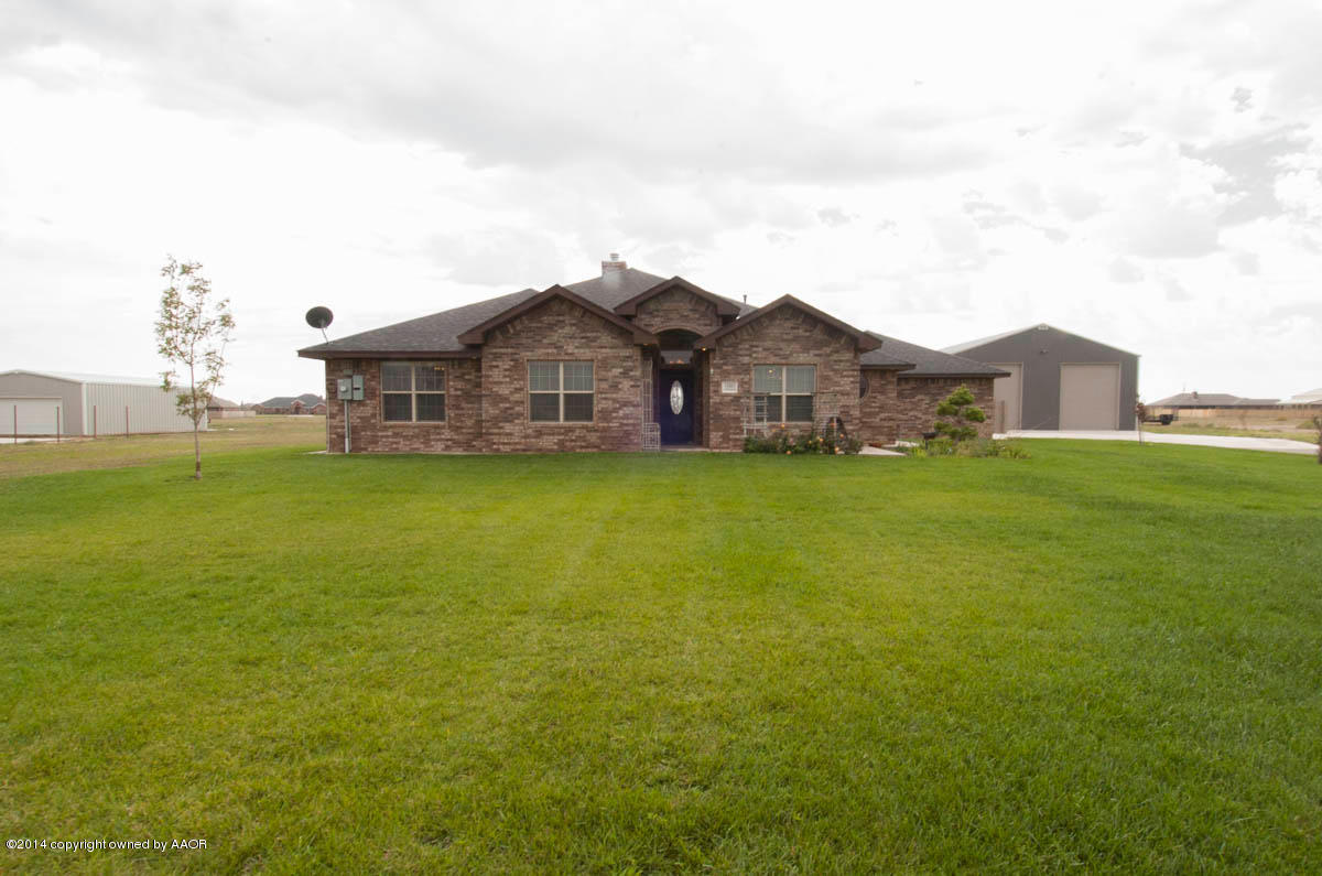 18301 Copper Ridge Bushland, TX 79124 - Photo 2 of 38 a view of a house with a big yard and large trees
