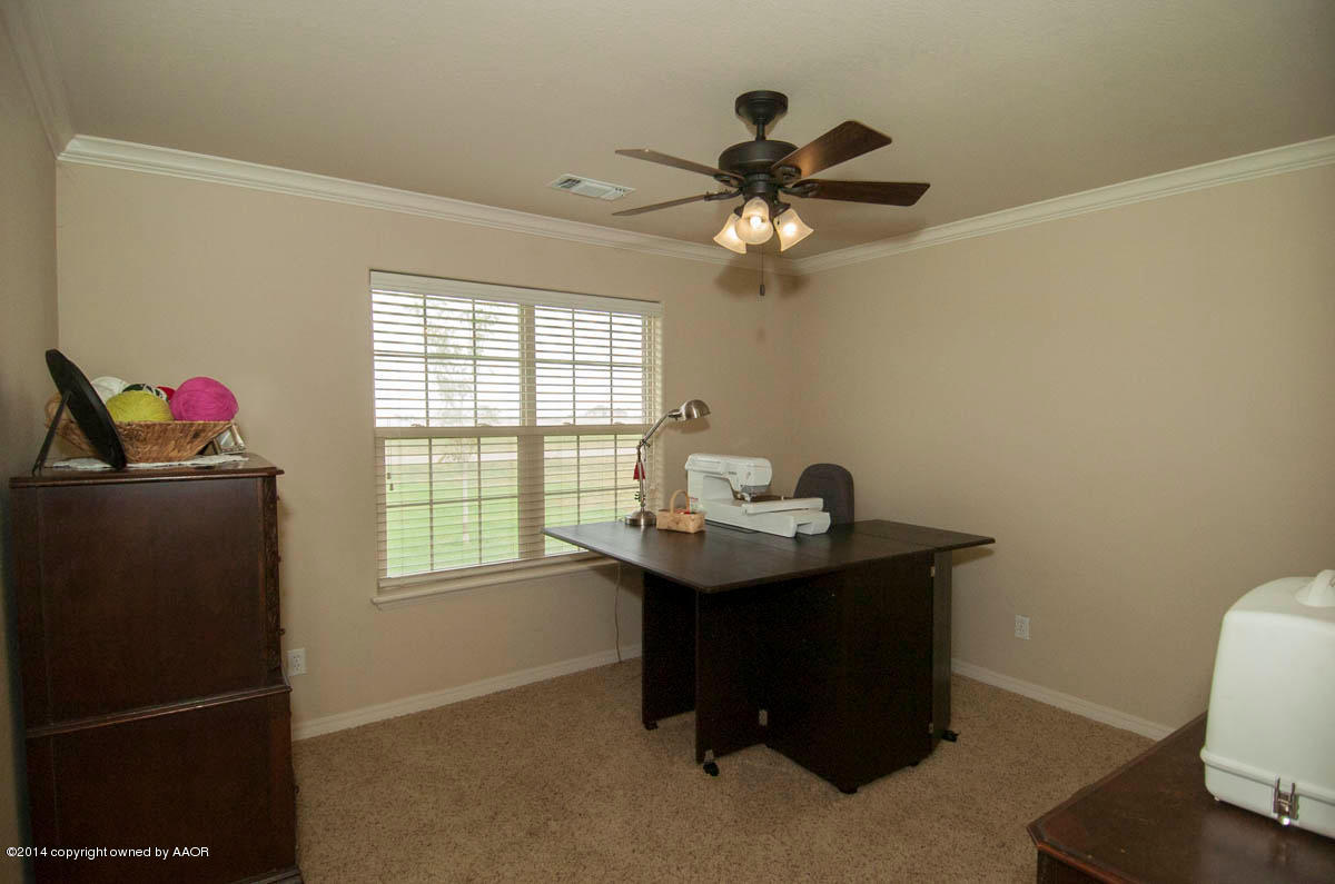 18301 Copper Ridge Bushland, TX 79124 - Photo 25 of 38 a view of a workspace with furniture and a window