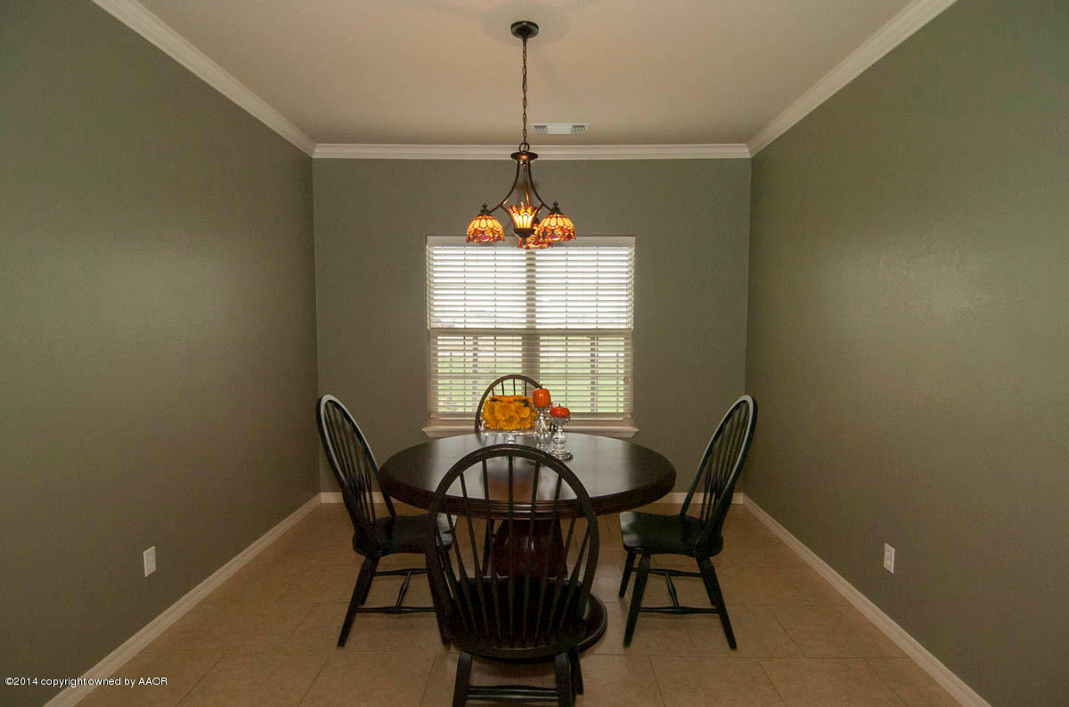 18301 Copper Ridge Bushland, TX 79124 - Photo 10 of 38 a view of a dining room with a table and chairs