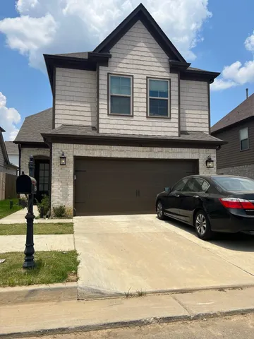 a house view with a outdoor space