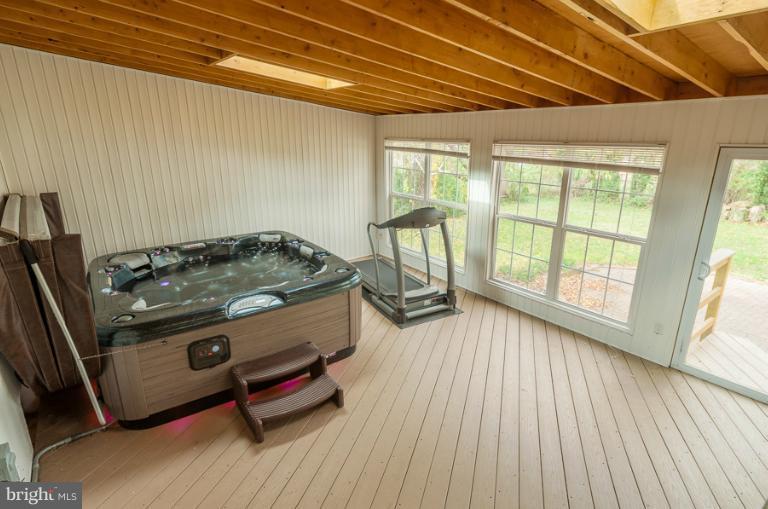 5656 Calyn Road Catonsville, MD 21228 - Photo 22 of 30 Sunroom with Hot Tub