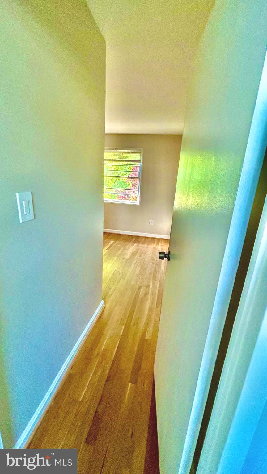 5319 Pooks Hill Road, Unit 1 Bethesda, MD 20814 - Photo 16 of 37 a view of a room with wooden floor