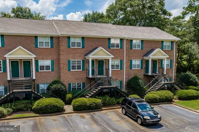 a view of a balcony with a potted plant