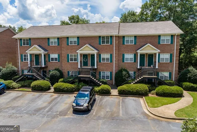 a view of a house with a large window