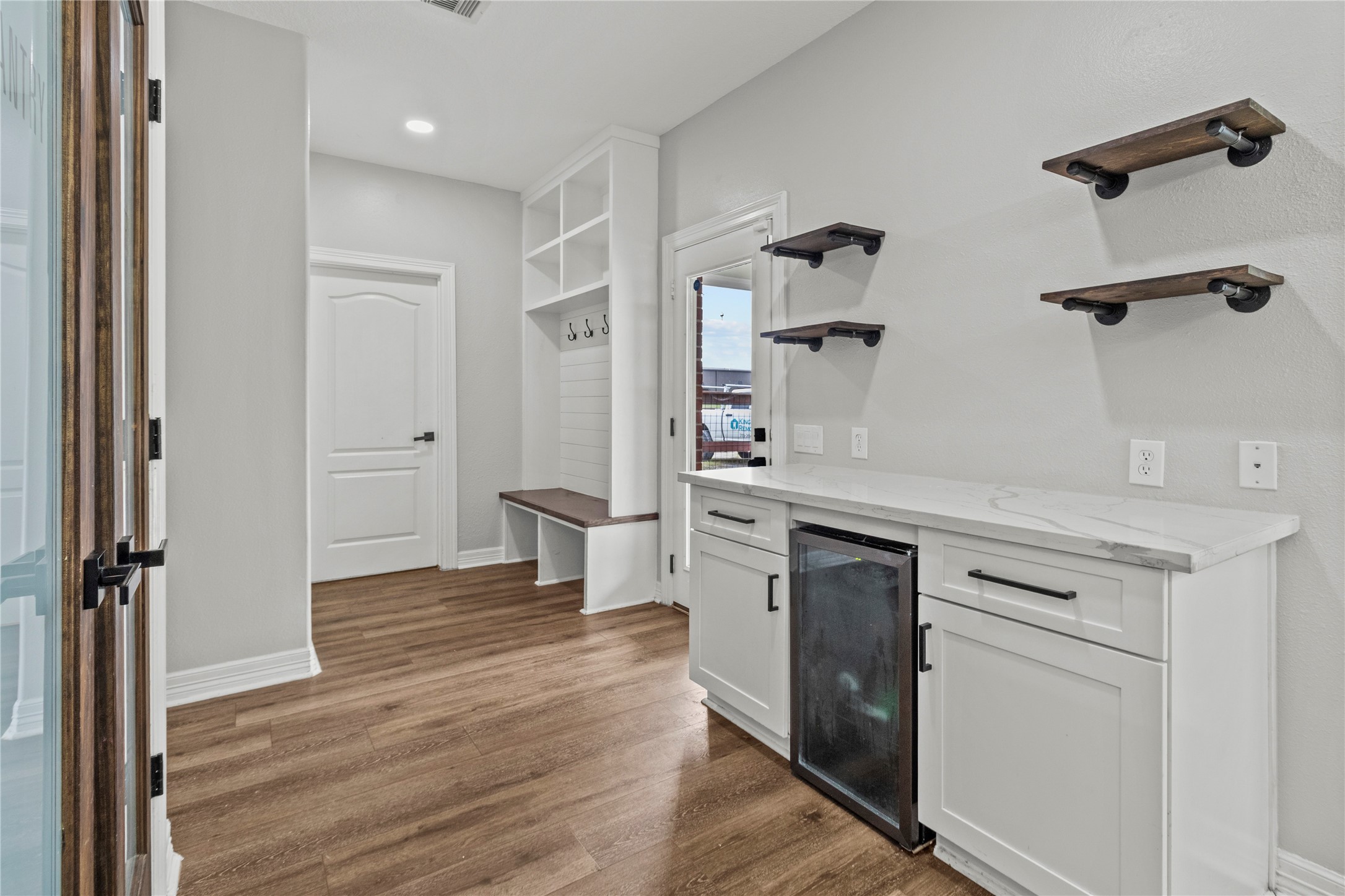 2730 Lawrence Road Kemah, TX 77565 - Photo 11 of 48 a kitchen with a refrigerator and a stove top oven