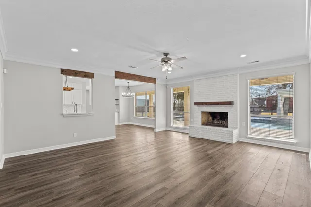 a view of a hallway with seating space