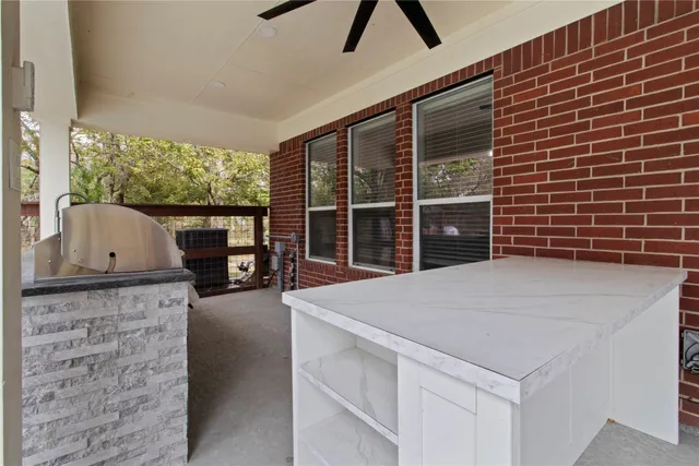 a kitchen with stainless steel appliances granite countertop a stove and a sink