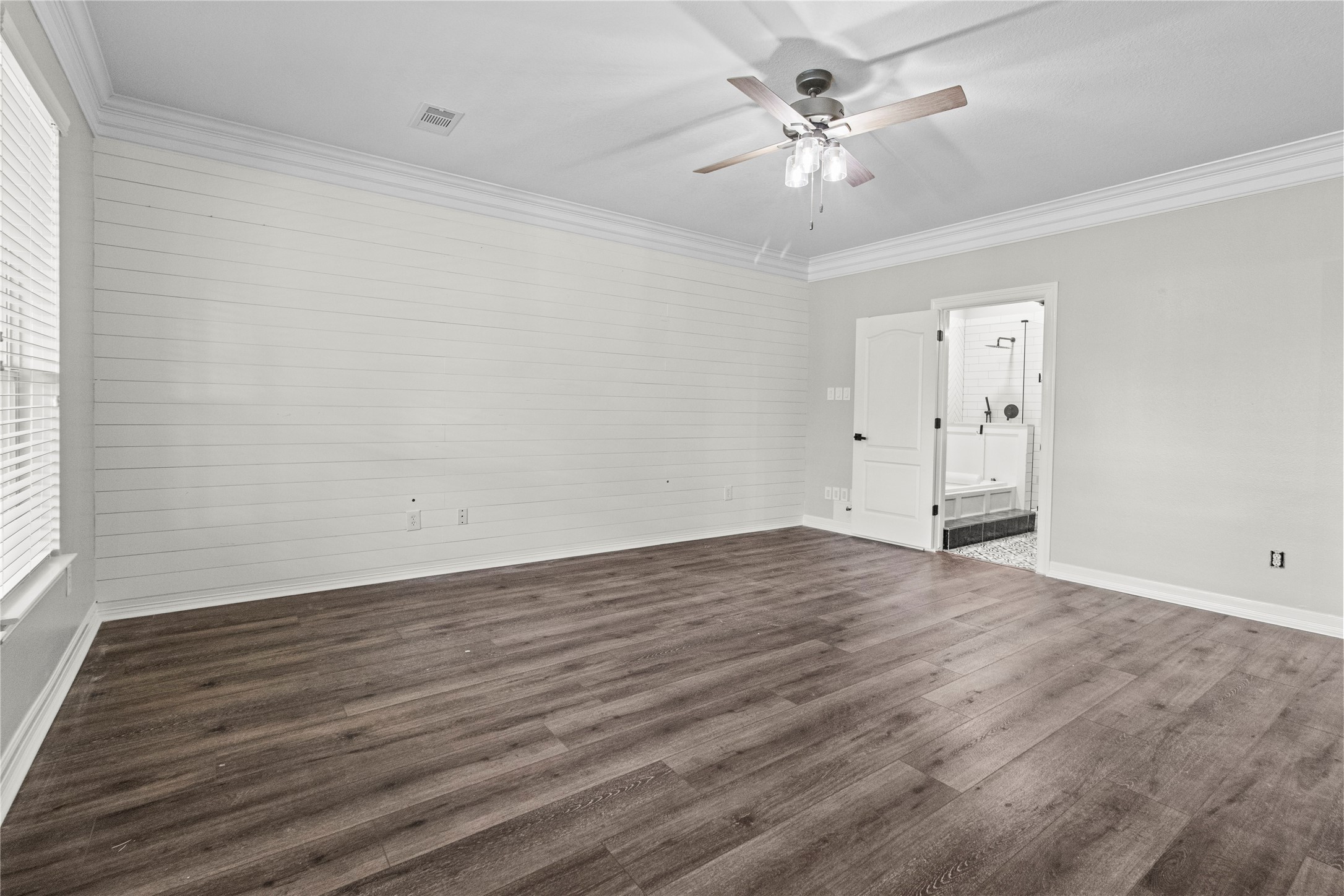 2730 Lawrence Road Kemah, TX 77565 - Photo 26 of 48 an empty room with wooden floor and ceiling fan