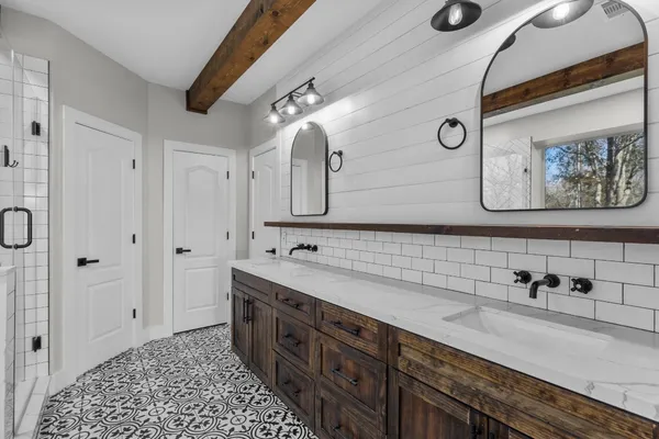 a view of a room with wooden walls