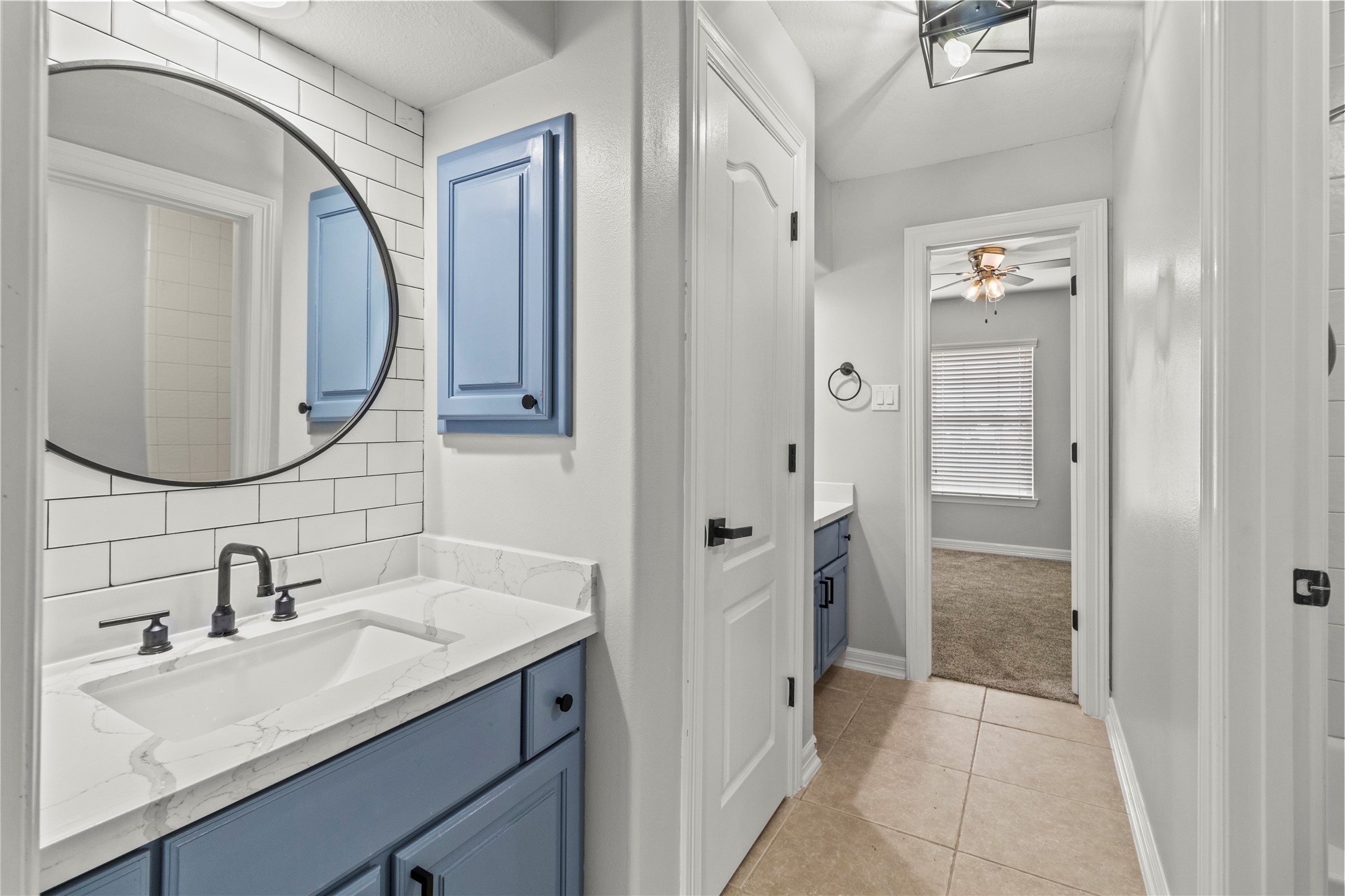 2730 Lawrence Road Kemah, TX 77565 - Photo 35 of 48 a bathroom with a sink and a mirror