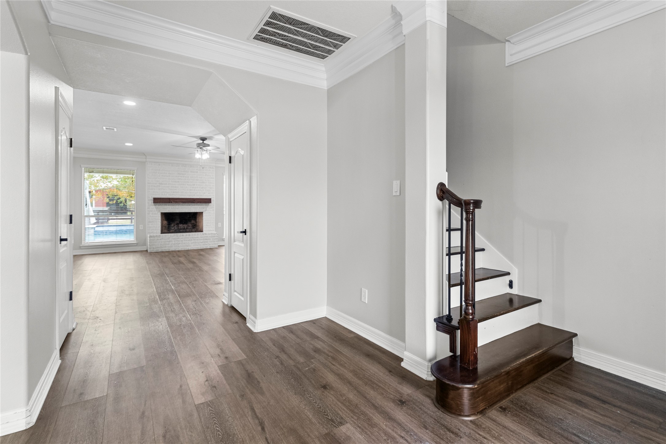 2730 Lawrence Road Kemah, TX 77565 - Photo 48 of 48 a view of a hallway with wooden floor and staircase