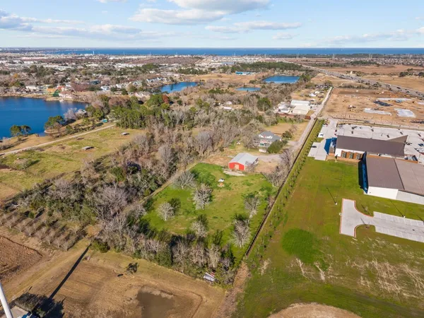 a view of entryway with wooden floor and stairs