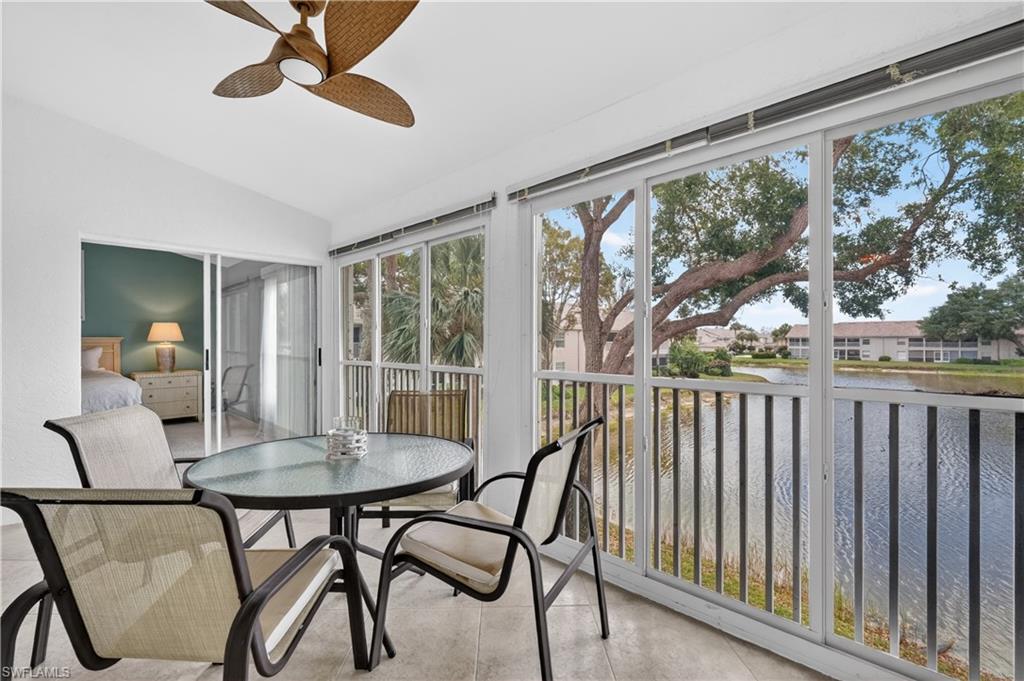 13061 Hamilton Harbour Drive, Unit R5 Naples, FL 34110 - Photo 15 of 39 a view of a dining room with furniture window and outside view