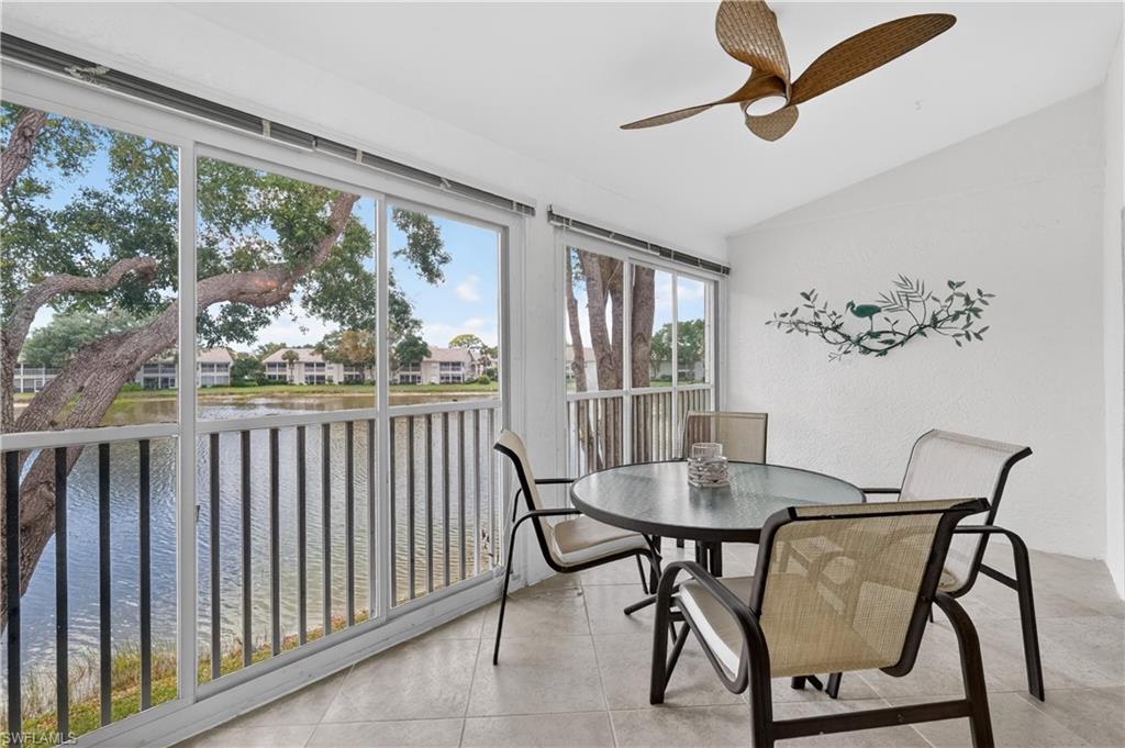 13061 Hamilton Harbour Drive, Unit R5 Naples, FL 34110 - Photo 16 of 39 a view of a dining room with furniture window and outside view