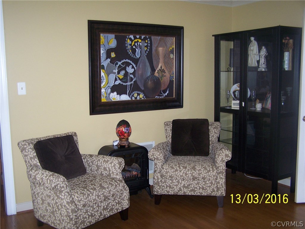 14011 Shadow Ridge Road Midlothian, VA 23112 - Photo 7 of 21 a living room with furniture and painting on the wall
