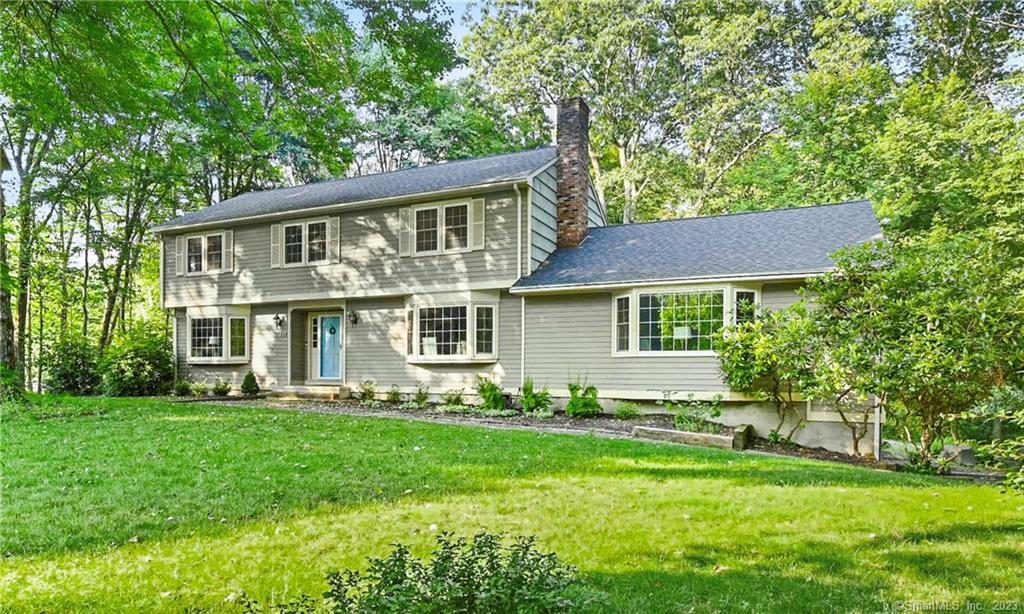 19 Lynnbrook Road Trumbull, CT 06611 - Photo 1 of 1 a front view of a house with a garden