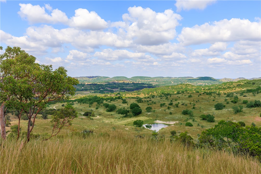 0 Brushy Ridge Trail Blanco, TX 78606 - Photo 17 of 27 a view of a lake from a yard