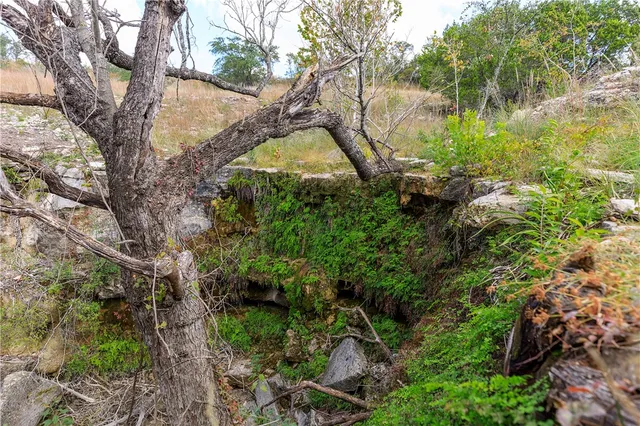 a view of a lake with mountains in the background