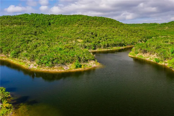a view of a lake with a house