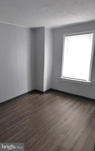 620 Frederick Street Hanover, PA 17331 - Photo 3 of 10 an empty room with wooden floor and windows