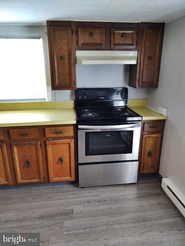 620 Frederick Street Hanover, PA 17331 - Photo 9 of 10 a stove top oven sitting inside of a kitchen