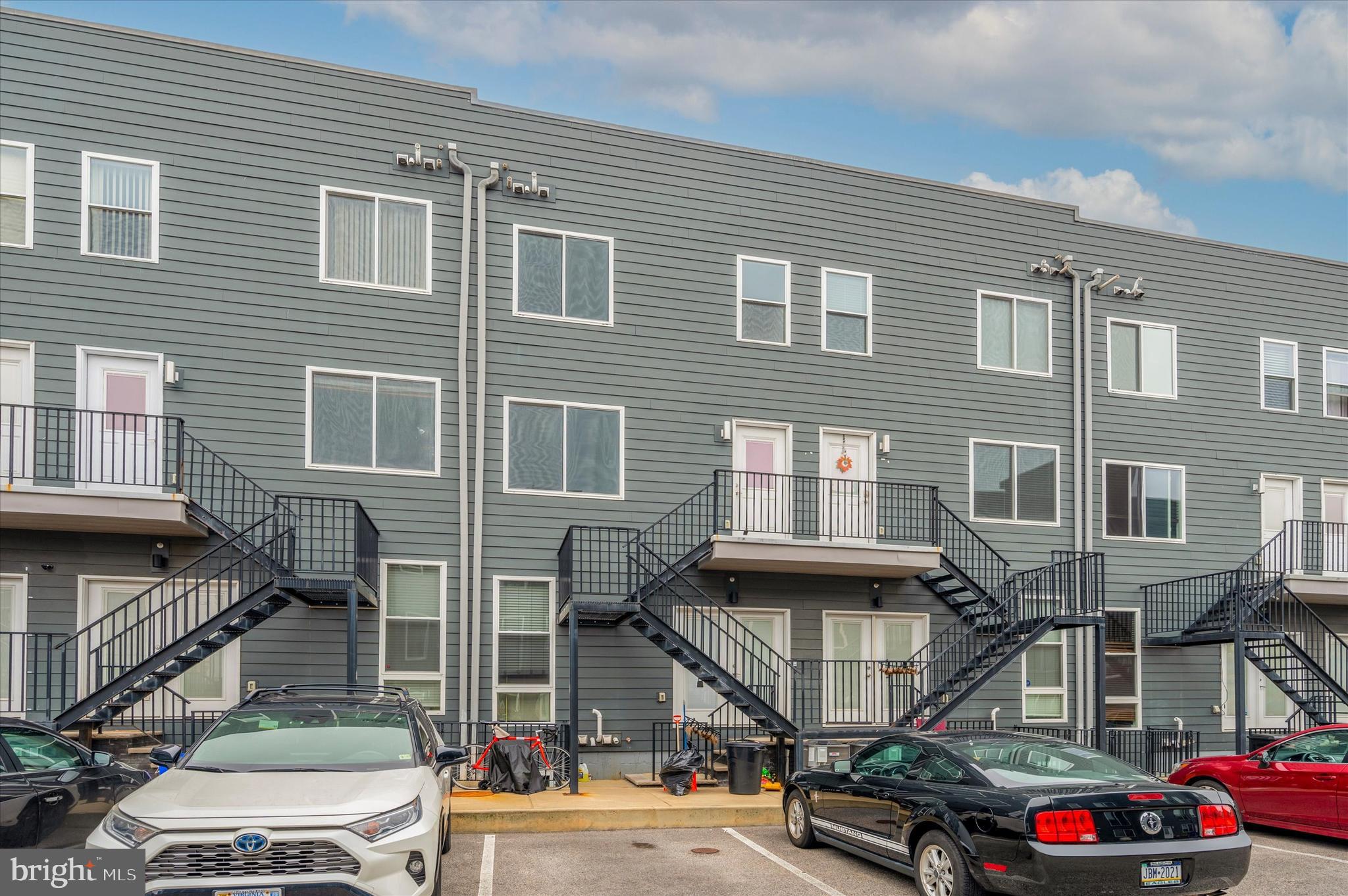 1219 North 5th Street, Unit 2 Philadelphia, PA 19122 - Photo 3 of 16 a car parked in front of a building