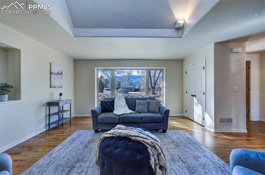 1905 Mesa Road Colorado Springs, CO 80904 - Photo 11 of 44 a living room with furniture and a wooden floor