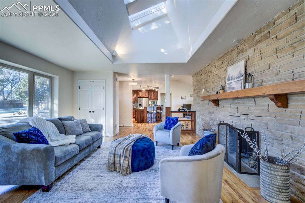 1905 Mesa Road Colorado Springs, CO 80904 - Photo 4 of 44 a living room with furniture and a fireplace