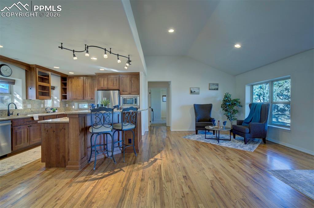 1905 Mesa Road Colorado Springs, CO 80904 - Photo 42 of 44 a living room with furniture and kitchen view